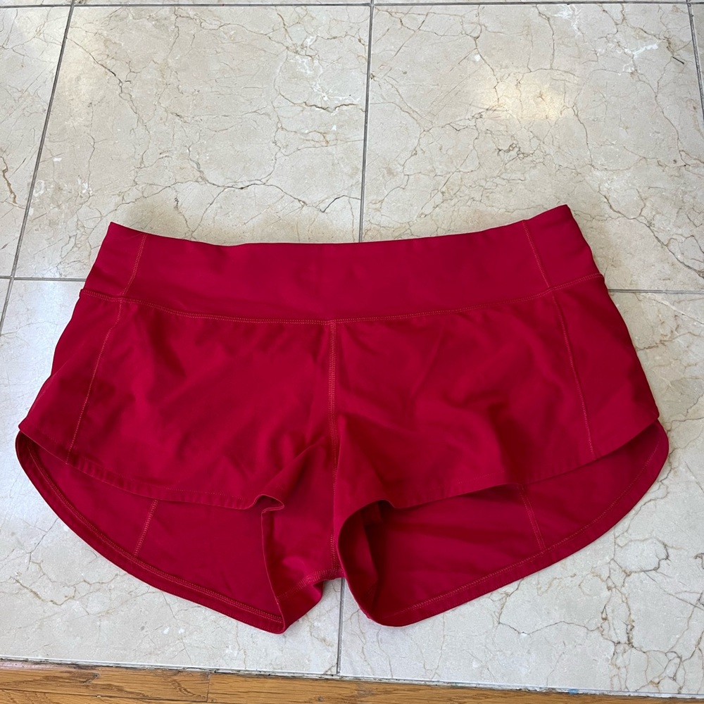 Lululemon Dark Red (a discontinued color) Speed Ups Low Rise 2.5in; size 8
